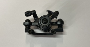 Суппорт дискового тормоза  задний фото 117052